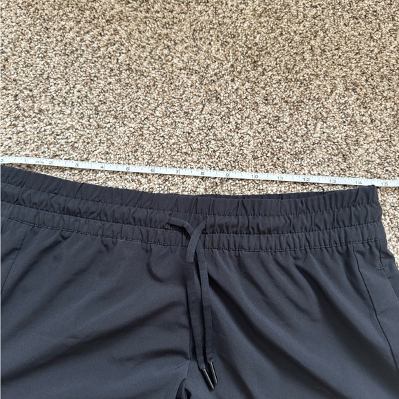Athleta Baja Perforated Laser Cut Featherweight
Stretch Drawstring Shorts 4 - Picture 6 of 6